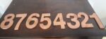 Wood edge copper table numbers